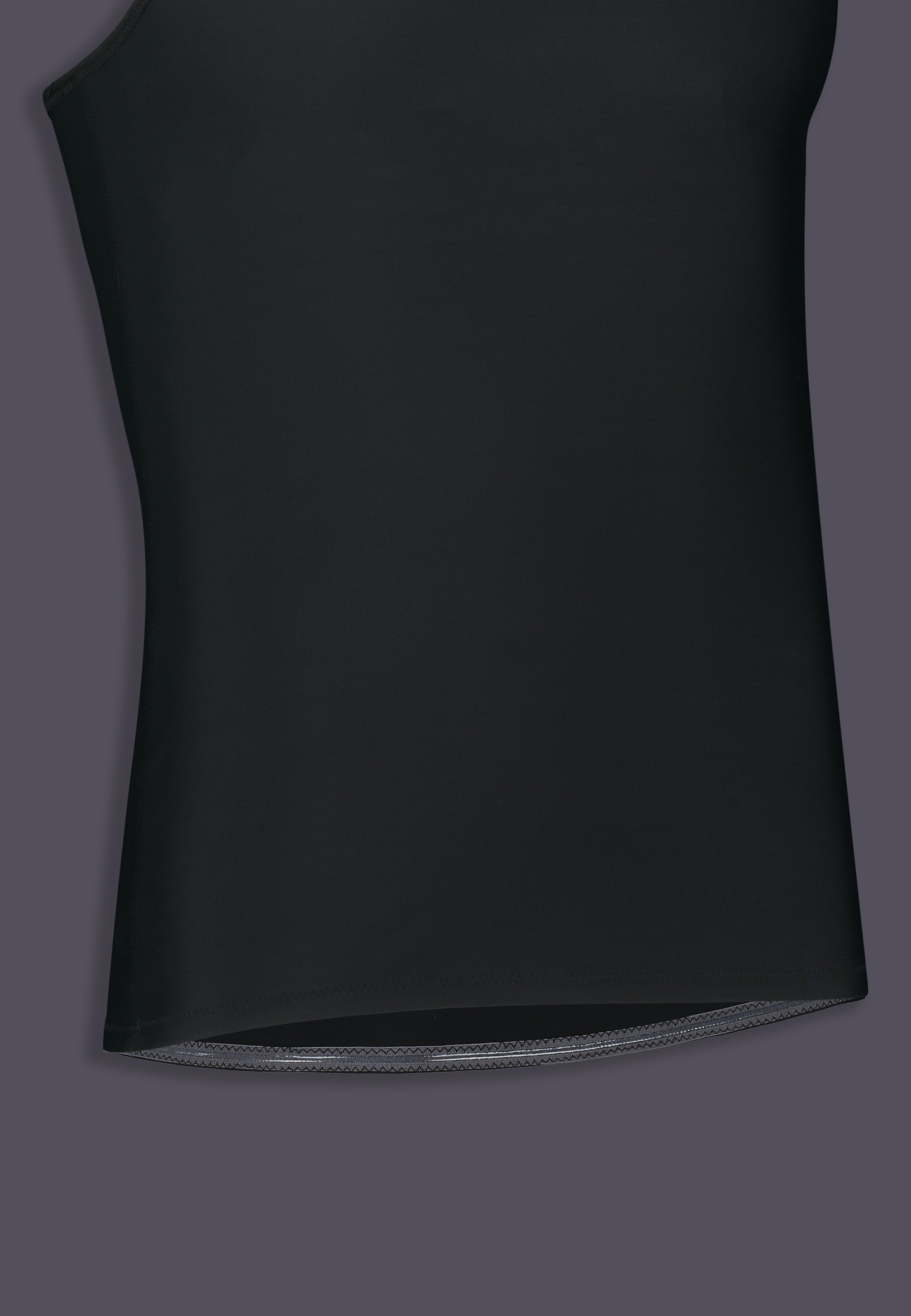 Detailaufnahme des Saumbands des UNTAG langen Tank Chest Binders