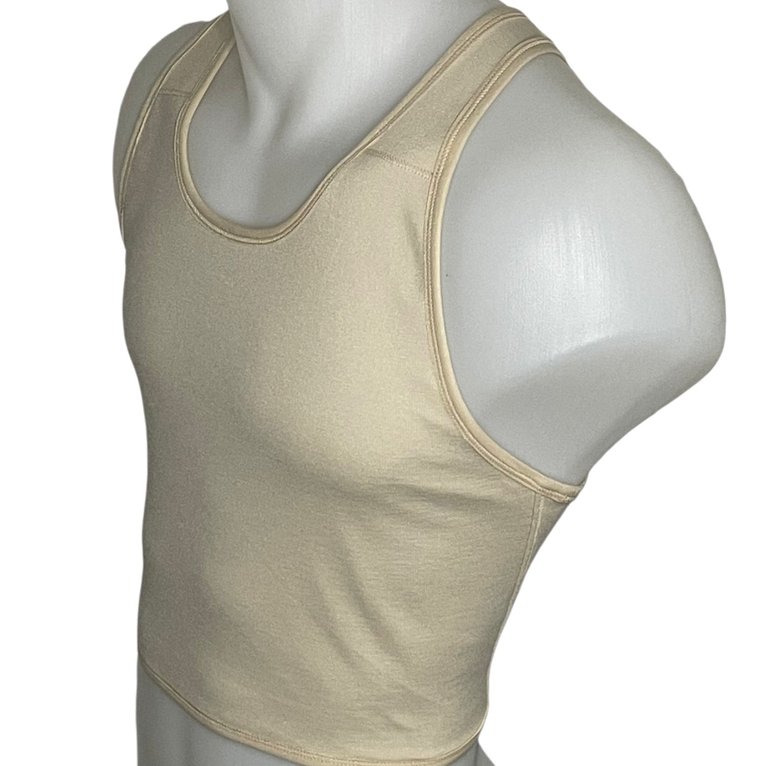 TransUndeez extra strong korte chest binder zijaanzicht in het beige