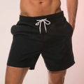 BWYA swim shorts in black, front view