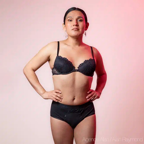 BWYA lace tucking shorty in black, worn by model, front view